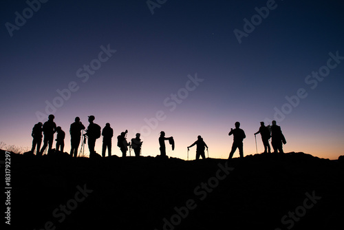 Mountaineers climbing at night. Mountaineers setting out from the Dilberdüzü plateau at dawn to climb the summit. Mountaineers climbing the Kaçkar Mountains at dusk. Artvin, Türkiye.