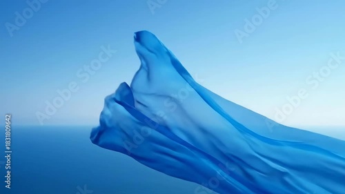 Wallpaper Mural Flowing Blue Fabric Against a Serene Ocean Horizon. Torontodigital.ca