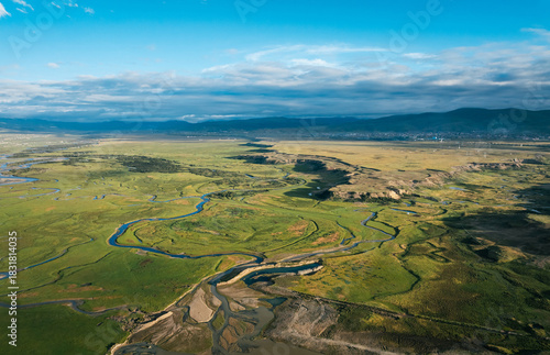 Beautiful curving rivers and green grassland in Litang county, China