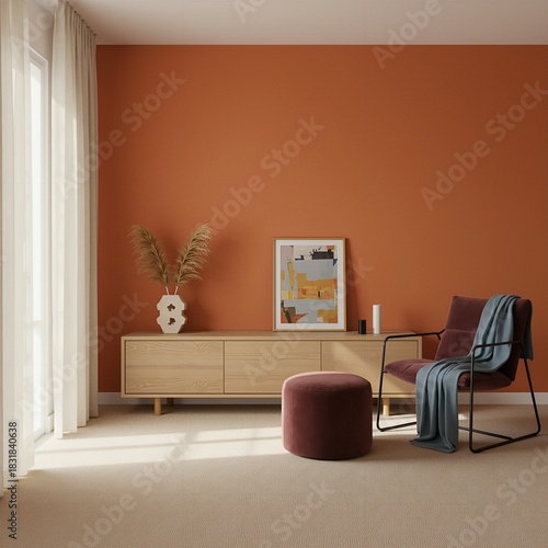 Bright orange wall with sideboard decor, burgundy footstool and blue armchair for modern interior design, contemporary home styling, aesthetic living space, commercial room concept


