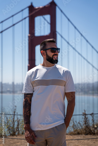 Stylish Bearded Man Enjoying Scenic View at Golden Gate Bridge