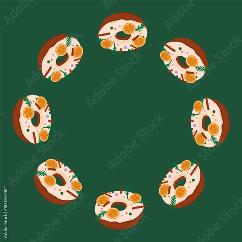 Frame of Christmas puddings with icing and decorations circular arrangement festive background. Copy space