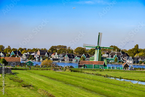 Busy summer day at the famous Zaanse Schans village, showcasing the landscape and visitors