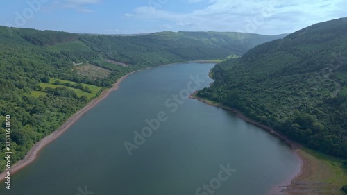 Ascending aerial view of Talybont Reservoir in Brecon Beacons National Park, Wales