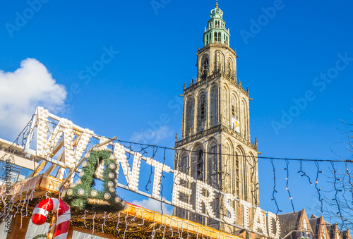 Letters forming the word Winterstad (Winter City) in front of the church tower in Groningen, Netherlands