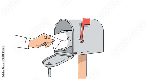 A person's hand carefully places a white envelope into a traditional silver mailbox, ready for postal service pickup.
