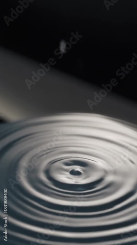 Slow Motion Splash of Elegant Cosmetic Liquid onto Minimalist Display Capturing Vivid Quality for High-Impact Visual Appeal and Allure