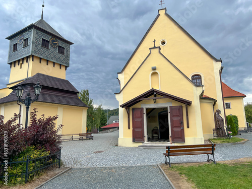 Square between the Chapel of Skulls, the cemetery, the bell tower and the church of St. Bartłomiej in Kudowa-Zdrój, a district of Czermno in Poland