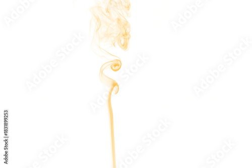 Abstract swirling smoke in vibrant orange and yellow hues against a stark black background creating a dynamic and ethereal visual