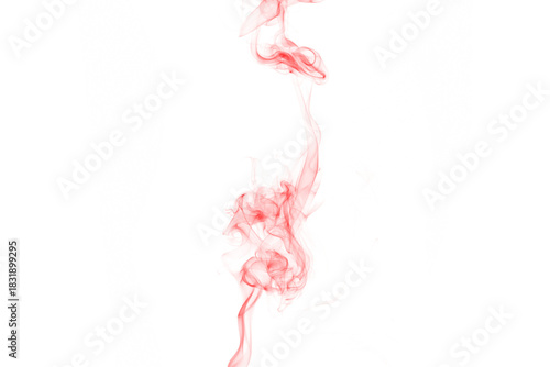 Abstract vertical flow of deep crimson red liquid against a stark black background