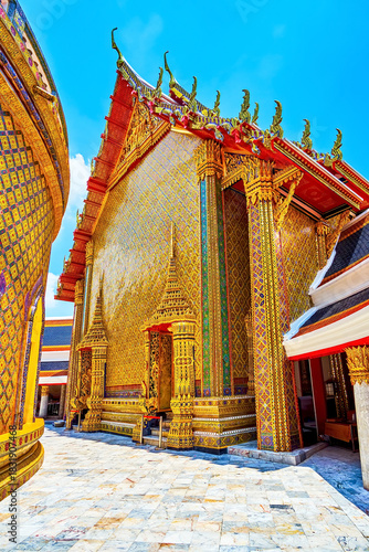 The shrine decorated with golden ceramic tiles, Wat Ratchabophit temple in Bangkok, Thailand