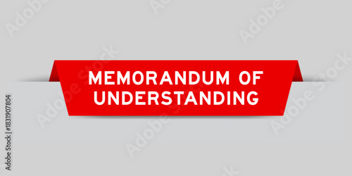 Red color inserted label with word memorandum of understanding on gray background
