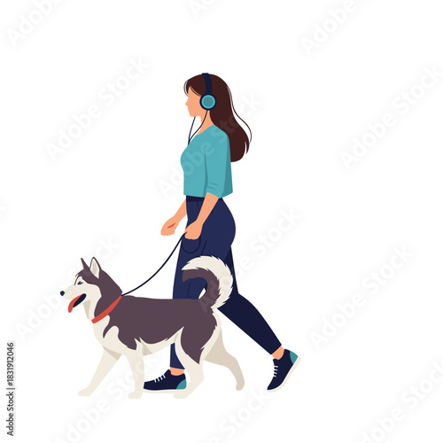 Woman walking her husky dog while listening to music in park  