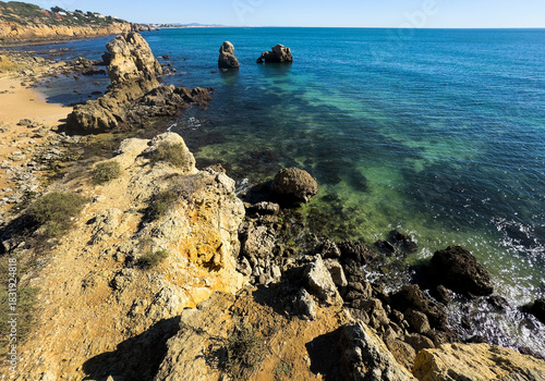 Rocky seashore. View of Praia da Vigia beach in Albufeira, Portugal, Europe