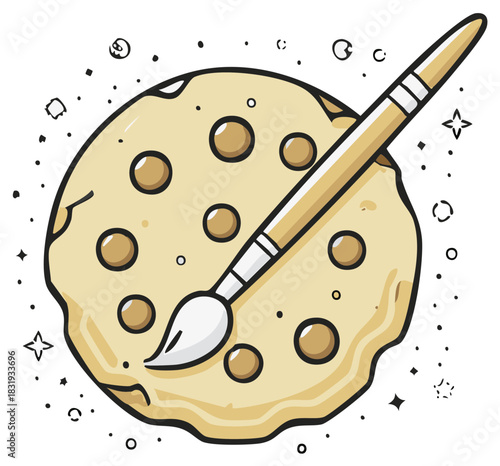 Chocolate chip cookie with paintbrush art creation and decorative elements
