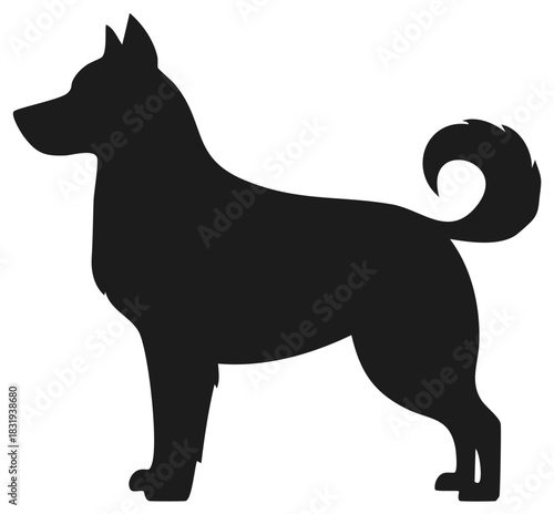Black dog silhouette standing with pointed ears and curled tail
