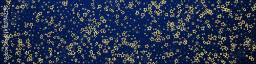 Gold sparkling star confetti.