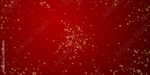 Gold sparkling star confetti.