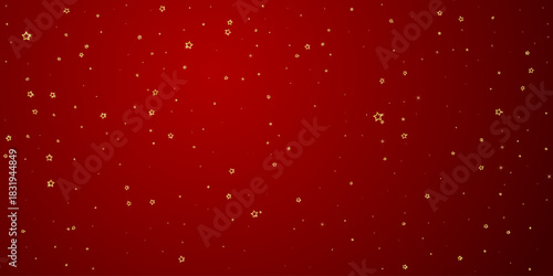 Gold sparkling star confetti.