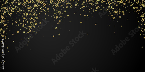 Gold sparkling star confetti.