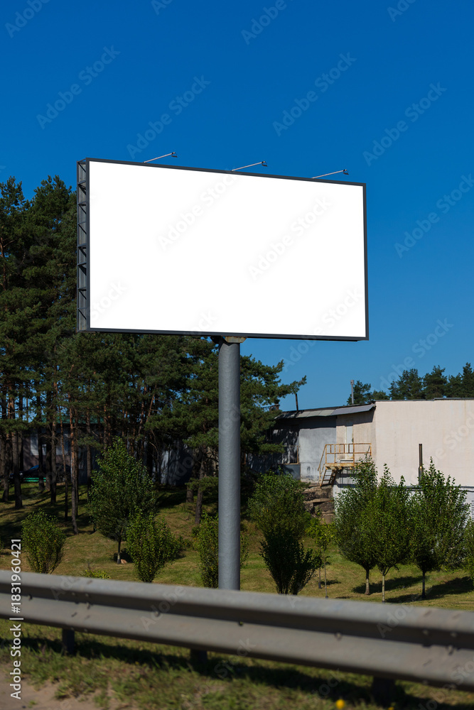 Obraz premium Background for design, white billboards on city streets and along roads in the summer day