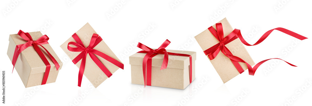 Naklejka premium Set of Christmas gift box made of cardboardwith red ribbon and bow isolated on white background with clipping path. Christmas, Valentines Day or Birthday celebration themes. Design element.