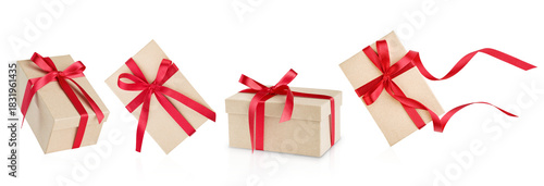 Set of Christmas gift box made of cardboardwith red ribbon and bow isolated on white background with clipping path. Christmas, Valentines Day or Birthday celebration themes. Design element.