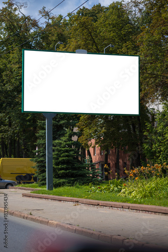 Background for design, billboards on city streets and along roads in the summer day