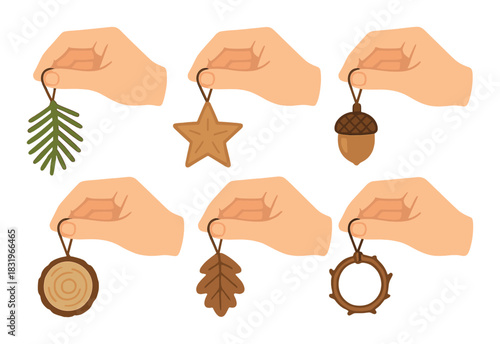 Hands holding rustic christmas ornaments: tree, star, acorn, and wood circles