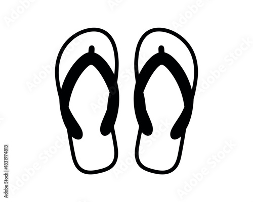 A pair of black and white flip flops isolated on a plain white background