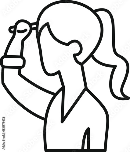 Woman applying eyebrow makeup getting ready for day or evening