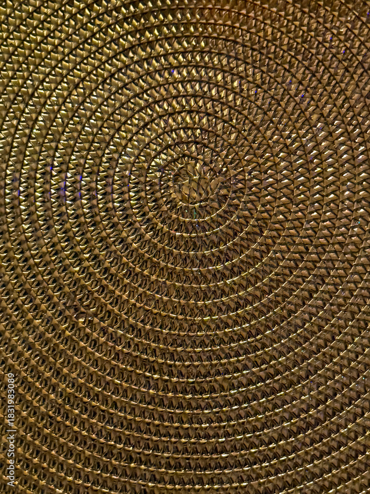 Fototapeta premium Woven gold colored table place mat