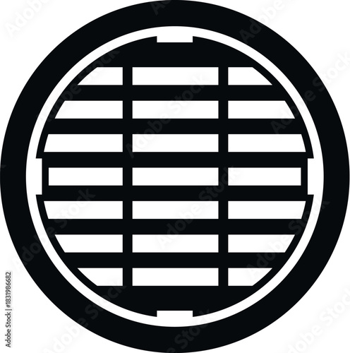 Round street sewer drain manhole cover with grate protecting underground infrastructure