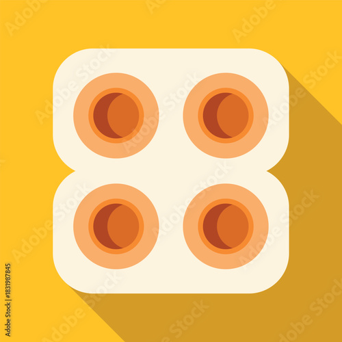 Blister pack with four round birth control pills on a yellow background