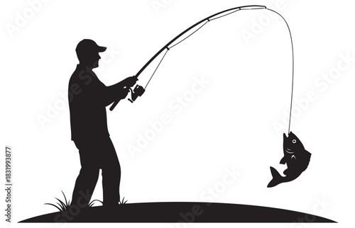 Silhouette of a fisherman casting a rod with a fish dangling from the hook in a moment of triumph