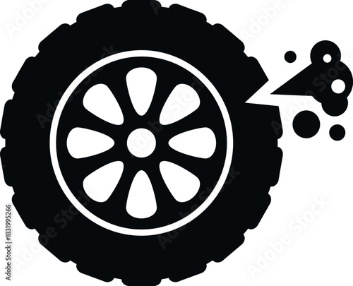 Vehicle wheel experiencing a blowout from a nail causing a flat tire