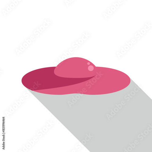 Pink sun hat with a broad brim casting a long shadow