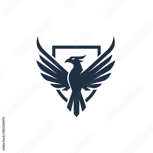 Elegant phoenix heraldic emblem design with spread wings and shield background icon