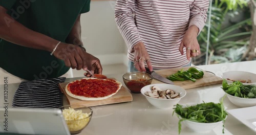 Cooking, hands and friends with pizza in kitchen for meal, dinner or food for health. Ingredients, vegetables and male people with preparing supper or lunch on board for wellness diet in apartment.