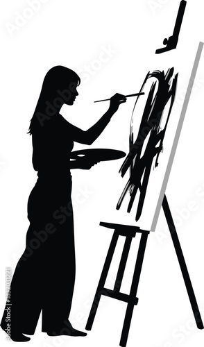 Silhouette of a female artist painting on an easel