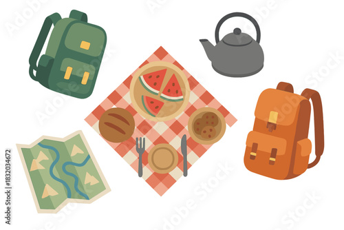 Outdoor picnic setup with backpacks, food, and a teapot on a checkered blanket