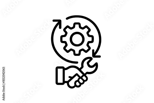 Hand holding wrench with gear symbolizing maintenance and repair tasks in industrial setting