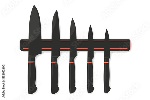 Knives displayed on a magnetic strip in a modern kitchen, showcasing sleek design and functionality