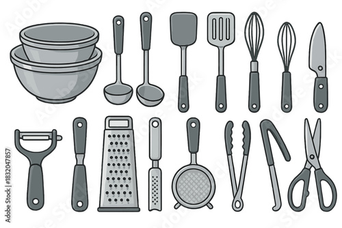 Kitchen tools and utensils arranged neatly on a countertop for cooking and baking activities at home