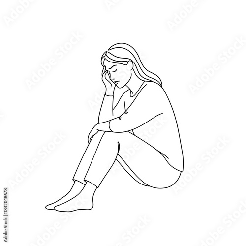 Distressed young woman sitting, clutching head, feeling sadness and sorrow.