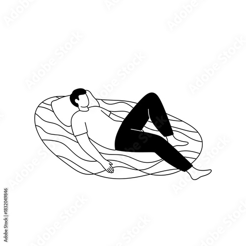 Person lying relaxed on a soft cushion, unwinding and resting comfortably