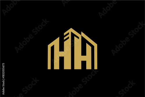 Golden HH Lettermark Logo Design with Building Silhouette.