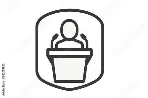 Public speaking event showcasing a speaker at a podium with microphones in a formal setting