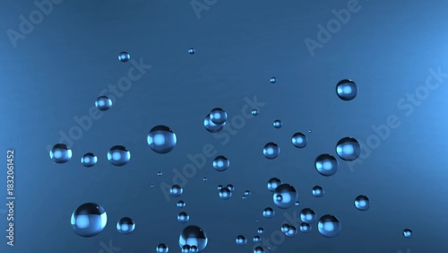 Bubbles floating in blue abstract liquid background