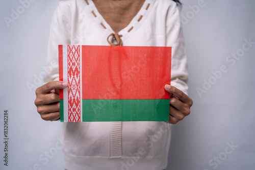 Person Proudly Holding the Belarus National Flag